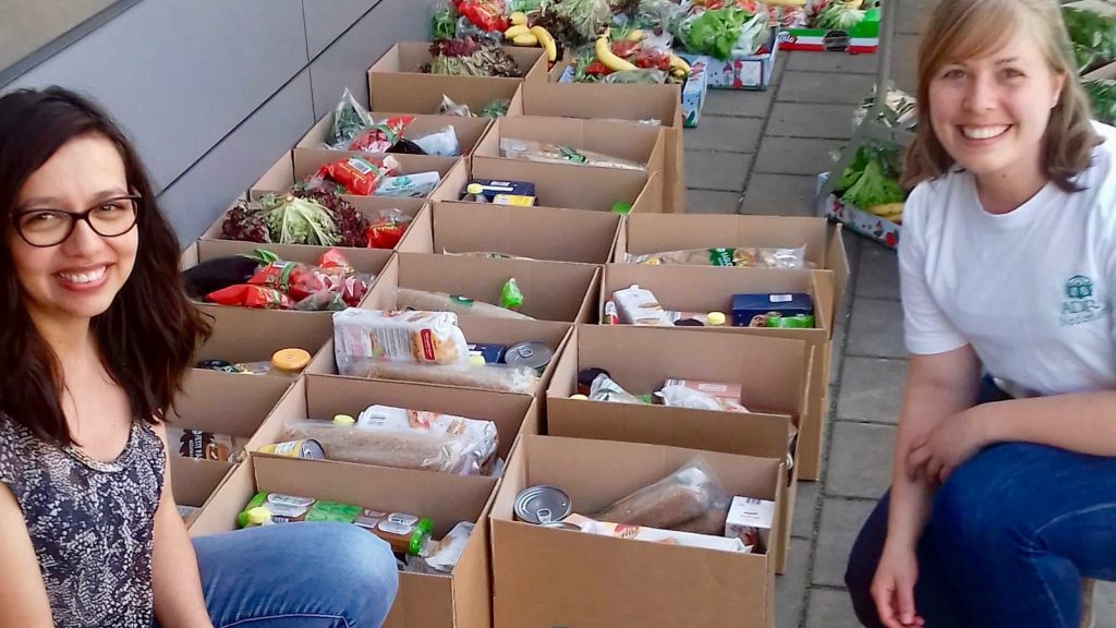 Ana and Esther help distribute food with ADRA in the Netherlands