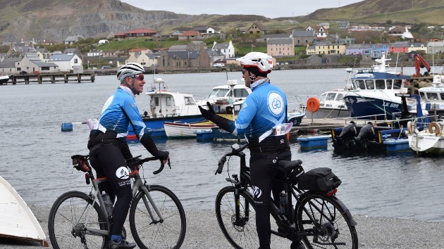 Anthony Kent (left) shares a light moment with Paul Tompkins during a stop at the Port of Scalloway on the Shetland mainland. 