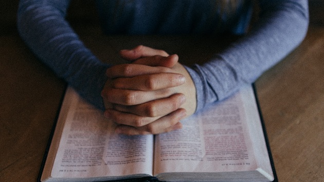 Praying Man with a Bible