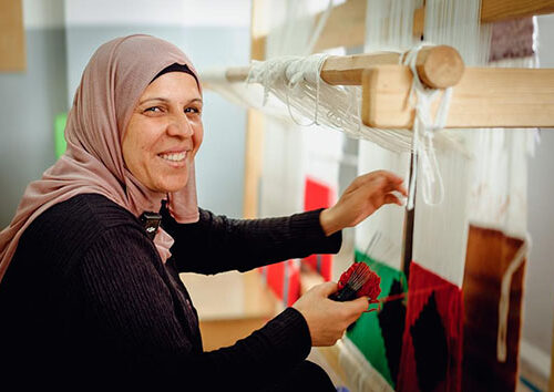 Surrounded by other women with similar stories of hardship and resilience, Moud took part in vocational training. ADRA, refugee Sabbath. 2025