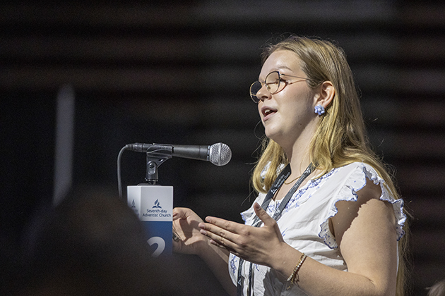 A delegate speaking at the mic. The 62nd General Conference Session of the Seventh-day Adventist Church, America’s Center Convention Complex, St. Louis, Missouri, USA, July 3-12, 2025. Camera date: Sunday, July 6, 2025 11:14.
