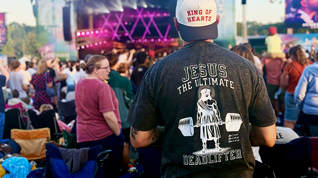 A man worships at BCF wearing a T-shirt that reads, ‘Jesus, the ultimate deadlifter.’