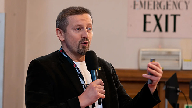 Paulin Giurgi, Vice President of Hope Media Europe, speaks on the theme “From Screens to Streets: Faith in Action,” encouraging communicators to transform online influence into real-world impact