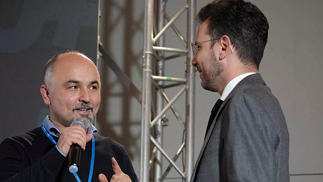 Hope Media Europe president Klaus Popa introduces book editor and professor Norel Iacob, who edited the new volume on the theme of finding purpose