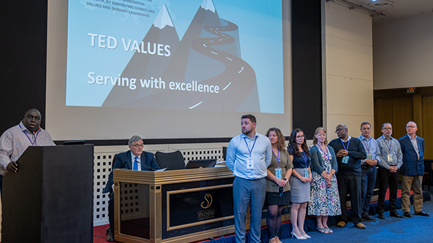 Kevin Johns, TED Associate Youth Director, presents the value "Serving with excellence"