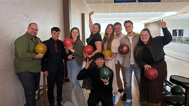 The young adults enjoy a game of bowling together on Saturday evening as GAiN Europe comes to a close