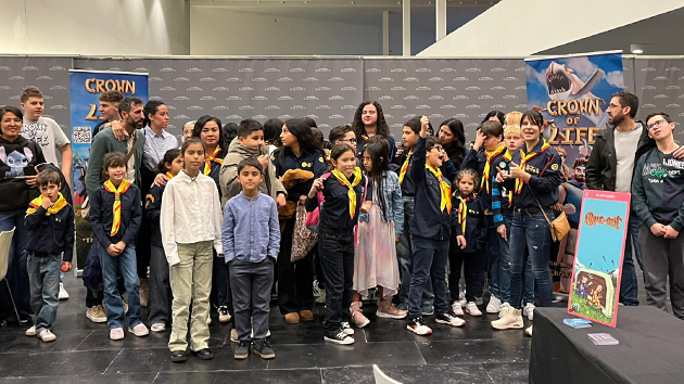 Adventist children, teenagers and parents gather for a group photo at the Palace of Congress in Pamplona, Spain