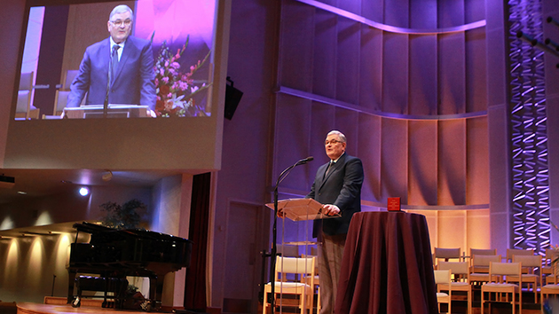 Daniel Duda addresses attendees at the Loma Linda University Church. His message, entitled “Excellence as Fruit of Grace, Not Proof of Worth”, was delivered moments after he received the Weniger Medallion