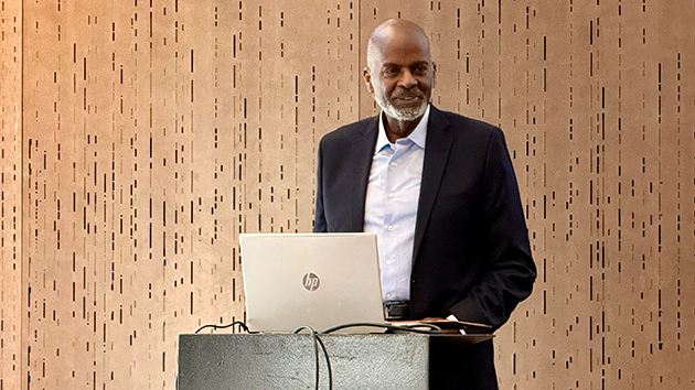 Dr Elie Henry, associate director of Public Affairs and Religious Liberty at the General Conference of Seventh-day Adventists, speaks during an evening worship service at the TED Combined Advisories