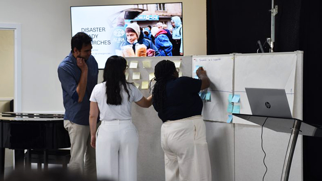 Participants work together in small groups during the Disaster Ready Churches training in Lisbon, Portugal