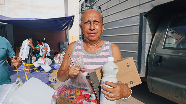 Oneida Oyárvez receives food and essential supplies provided through ADRA's emergency response following the earthquakes in Venezuela