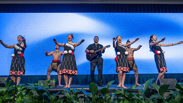 Participants perform a traditional Māori pōwhiri and haka during the opening programme
