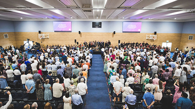 The congregation joins in worship during the Sabbath Divine Service