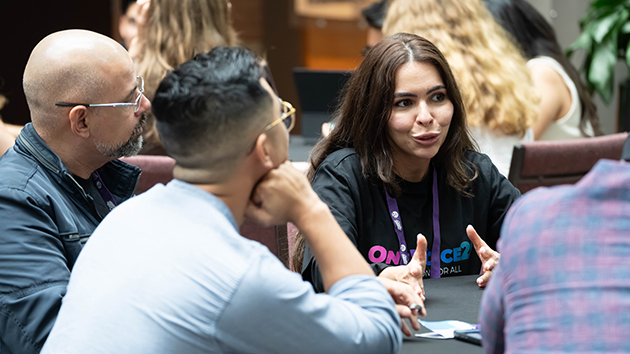 Participants engage in a collaborative planning session during the Creator Summit, sharing ideas to help proclaim Jesus through the global OneVoice27 initiative