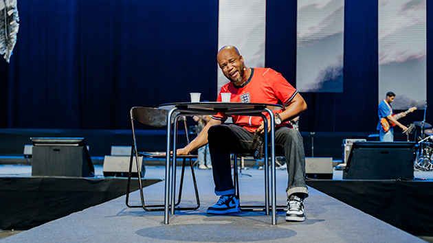 Damian Chandler delivers the opening sermon, reflecting on God’s invitation for everyone to join Him at His table