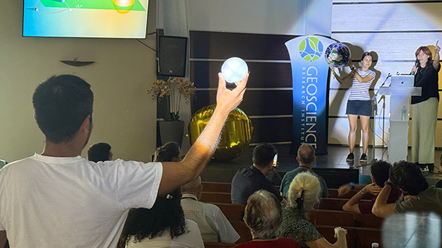 Attendees take part in an interactive session during the Faith and Science Conference in Sagunto, Spain